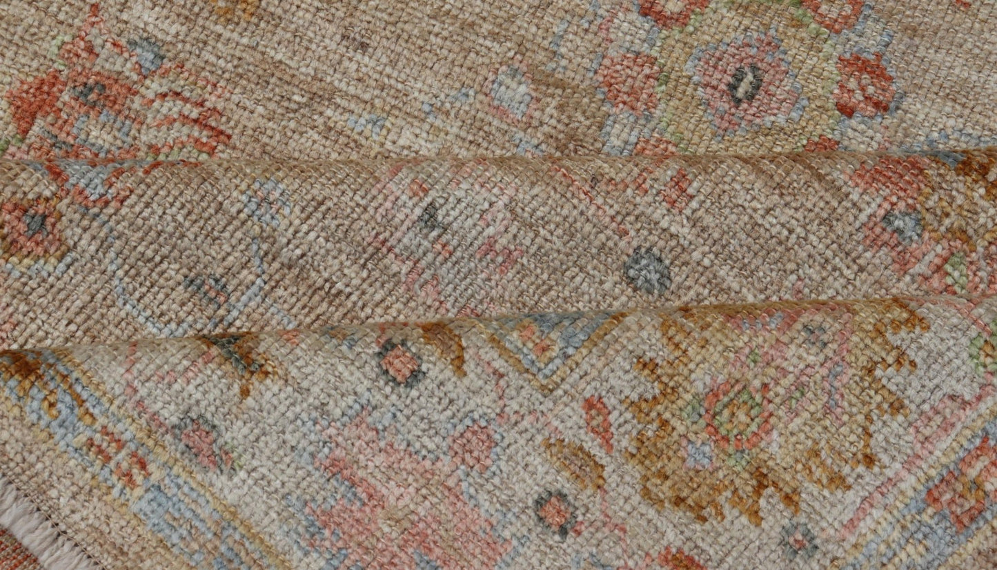 Turkish Oushak Floral Design with Color on A Taupe Field and Ivory Border This hand - knotted Oushak has a sub - floral Oushak design that spreads on the the field, rendered in coral, salmon, light blue, gold, and green. The background of the field... - Keivan Woven ArtsAN - 149322 - 19923Rug