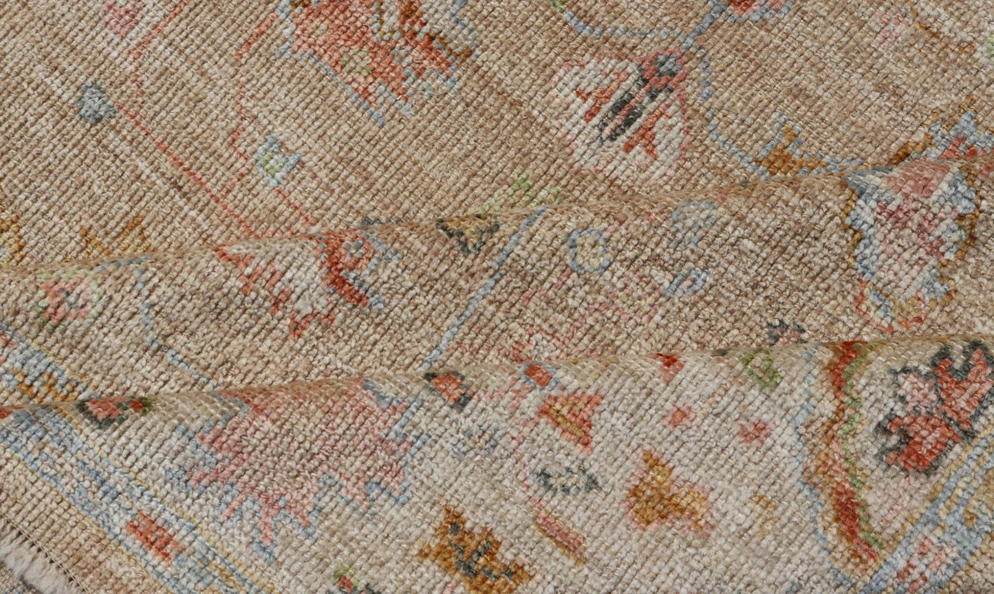 Floral Turkish Angora Oushak with Sandy - Taupe Background and Cream Border This Turkish Oushak was hand - knotted with angora wool. The field's background is rendered in a sandy - taupe, while the border's background is a cream color. The classic Ous... - Keivan Woven ArtsAN - 149571 - 19929Rug