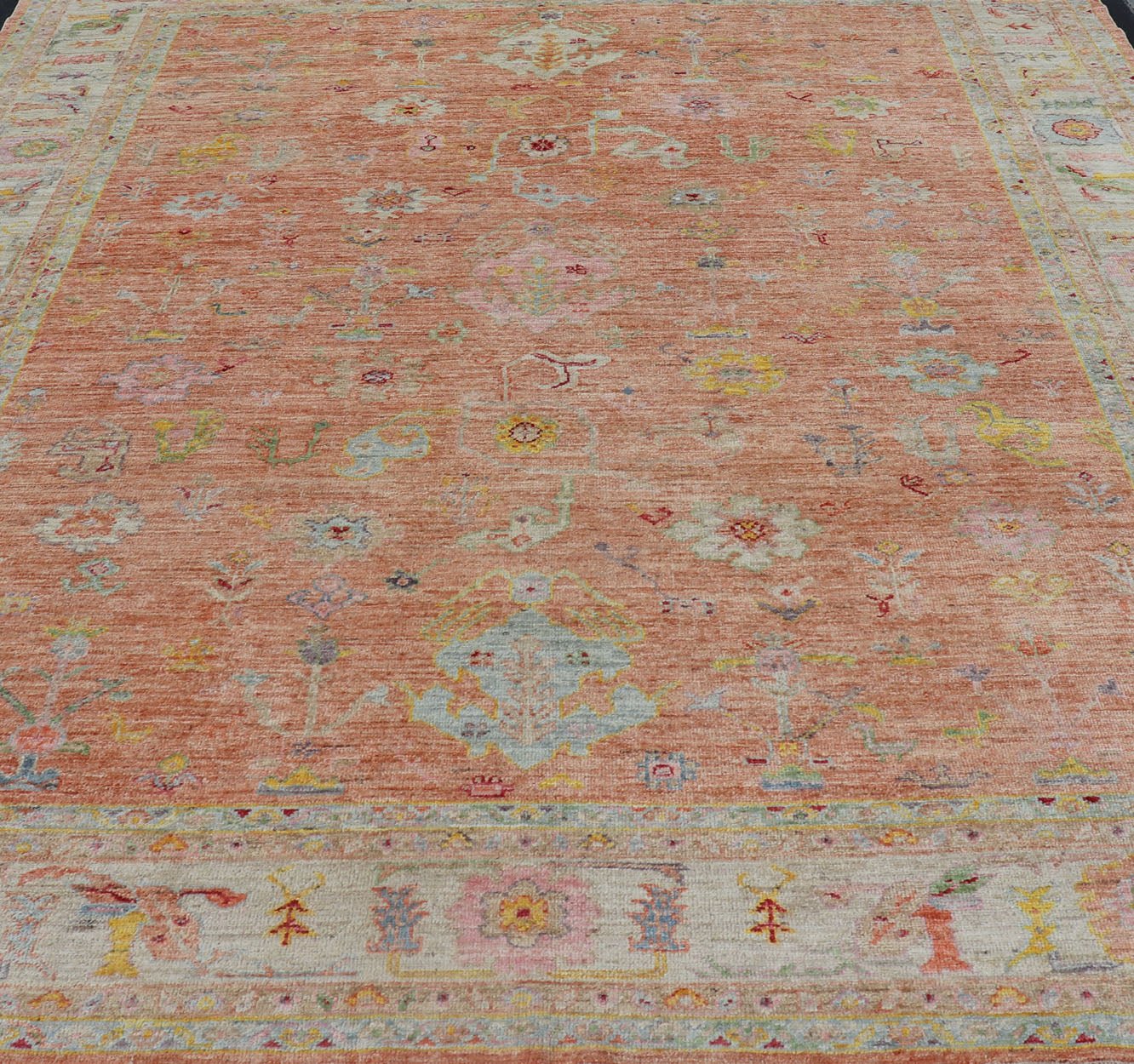Vibrant Floral Medley on Salmon Pink Hand - Knotted Rug by Keivan Woven Arts. rug / AN - 149682, Turkish 21st Century. Measures: 10'0 x 12'11 The rug showcase's a beautifully woven rug with a vibrant and colorful design on a warm salmon pink backgro... - Keivan Woven ArtsAN - 149682 - 16412Rug