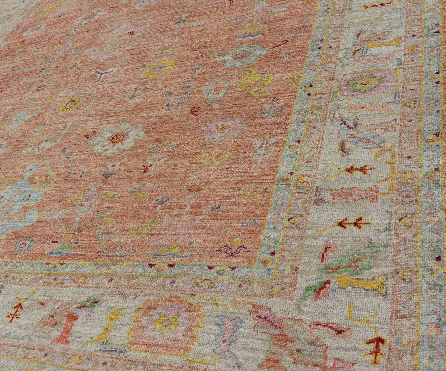 Vibrant Floral Medley on Salmon Pink Hand - Knotted Rug by Keivan Woven Arts. rug / AN - 149682, Turkish 21st Century. Measures: 10'0 x 12'11 The rug showcase's a beautifully woven rug with a vibrant and colorful design on a warm salmon pink backgro... - Keivan Woven ArtsAN - 149682 - 16412Rug