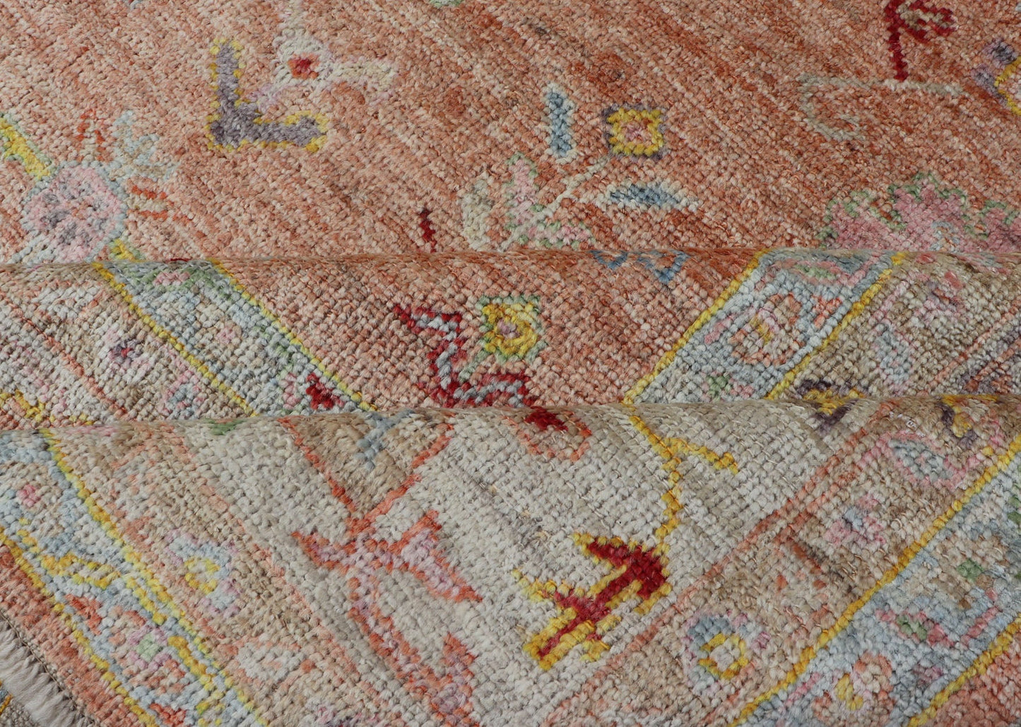 Vibrant Floral Medley on Salmon Pink Hand - Knotted Rug by Keivan Woven Arts. rug / AN - 149682, Turkish 21st Century. Measures: 10'0 x 12'11 The rug showcase's a beautifully woven rug with a vibrant and colorful design on a warm salmon pink backgro... - Keivan Woven ArtsAN - 149682 - 16412Rug