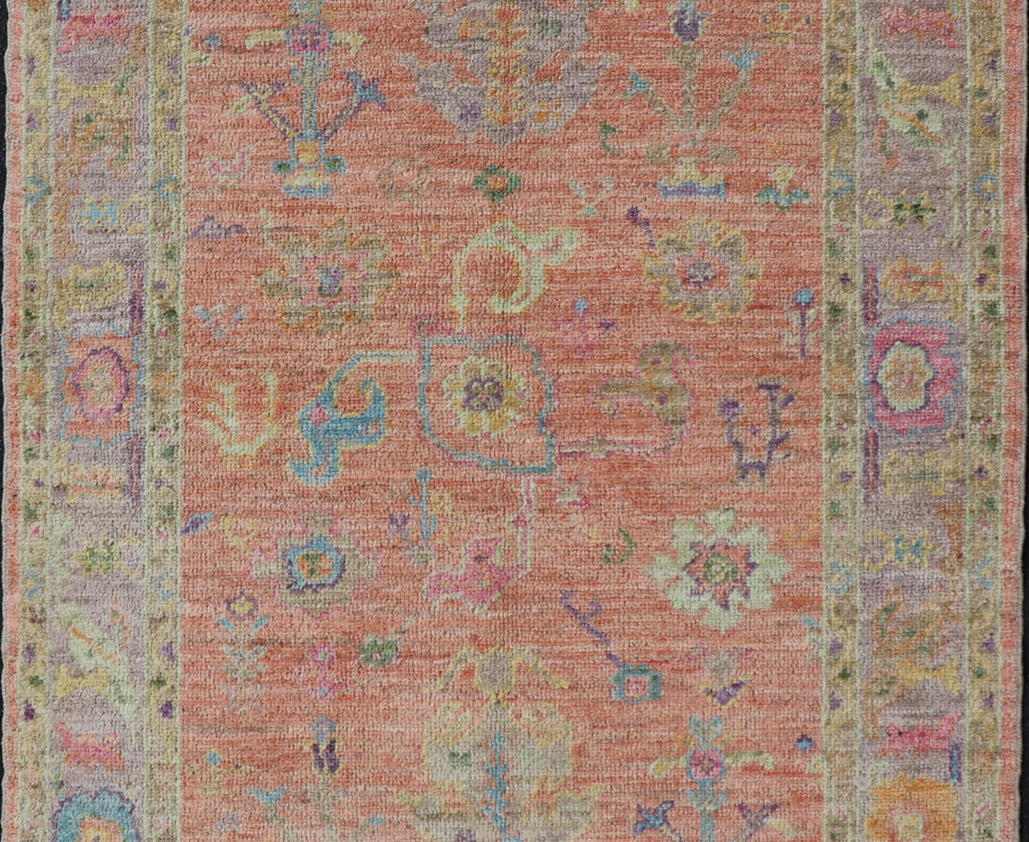 Hand Knotted Turkish Floral Oushak with Orange Background and Lilac Border This very unique piece has a wide array of bright colors, starting with a faded orange background and a light lilac border, showcasing fuchsia, electric blue, violet, or... - Keivan Woven ArtsAN - 149896 - 19941Rug