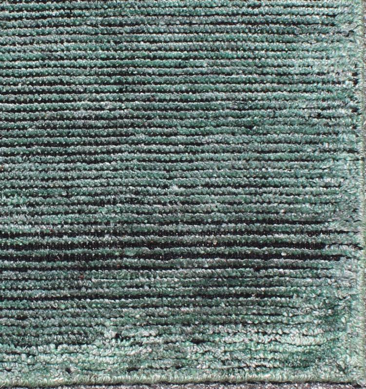COLOR - U A monochromatic composition emphasizes the streamlined design of this contemporary rug, the sheered down pile evokes a minimalist textured aesthetic. Faint pops of color shine against a solid field in this one - of - a - kind rug, each rug is organic... - Keivan Woven ArtsAPE - 43 - MAR - U - 6586Rug