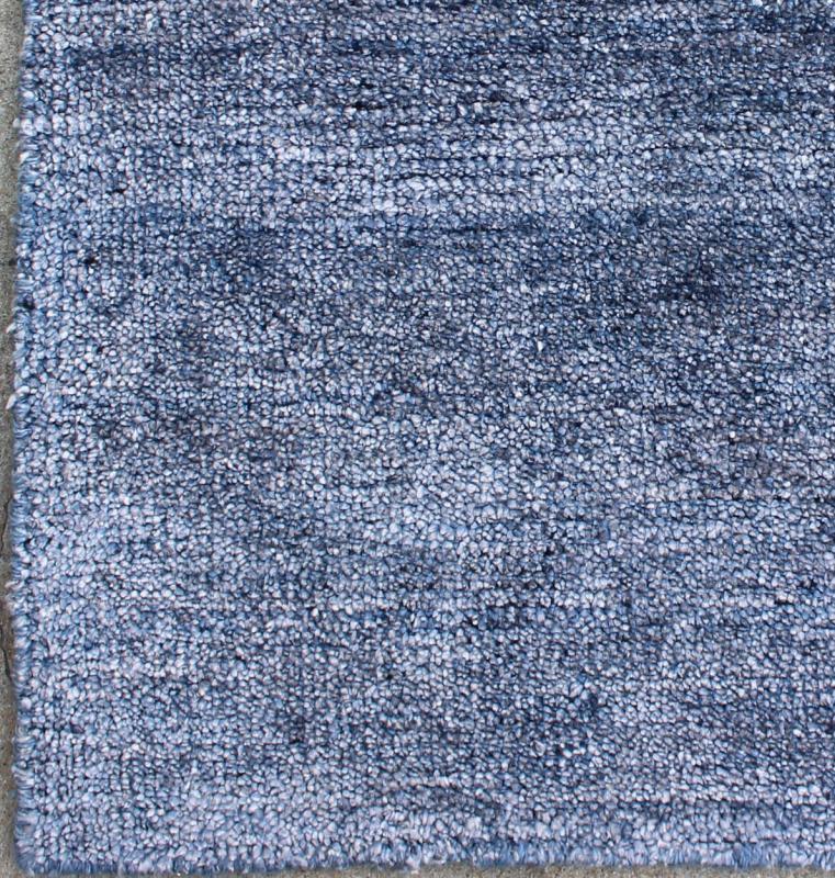 Color K A monochromatic composition emphasizes the streamlined design of this contemporary rug, the sheered down pile evokes a minimalist textured aesthetic. Faint pops of color shine against a solid field in this one - of - a - kind rug, each rug is organic... - Keivan Woven ArtsAPE - 8 - MAR - K - 6496Rug