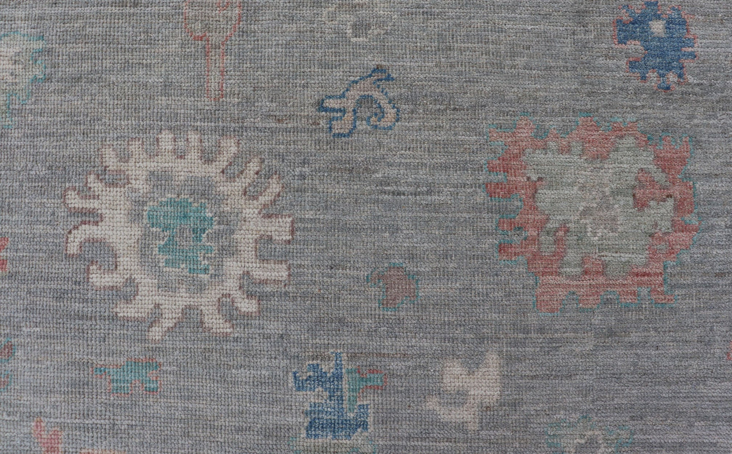 Measures: 7'10 x 9'8 All Over Modern Floral Oushak with A Light Blue - Gray Field and Border With Color. Keivan Woven Arts; rug AWR - 12018 Country of Origin: Afghanistan Type: Oushak Design: All - Over, Floral, Arabesque - Floral 21st Century This ... - Keivan Woven ArtsAWR - 12018 - 23360Rug