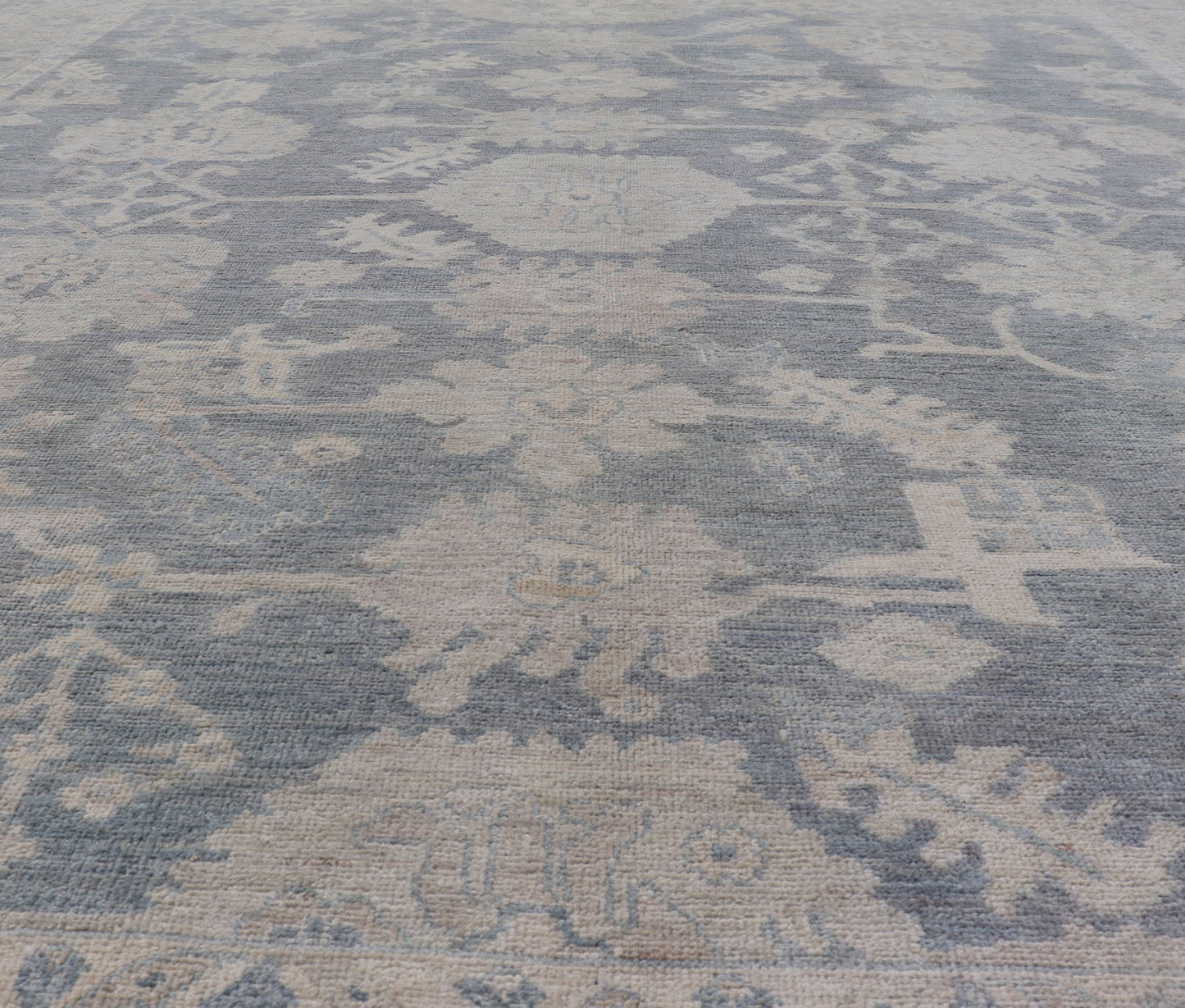 Measures: 8'2 x 9'11 Modern Oushak with Large Floral Motifs with Cream, Blue, and Steel Blue. Keivan Woven Arts; rug AWR - 12099 Country of Origin: Afghanistan Type: Oushak Design: Floral, All - Over Abstract - Tribal 21st century. This modern Ou... - Keivan Woven ArtsAWR - 12099 - 23372Rug