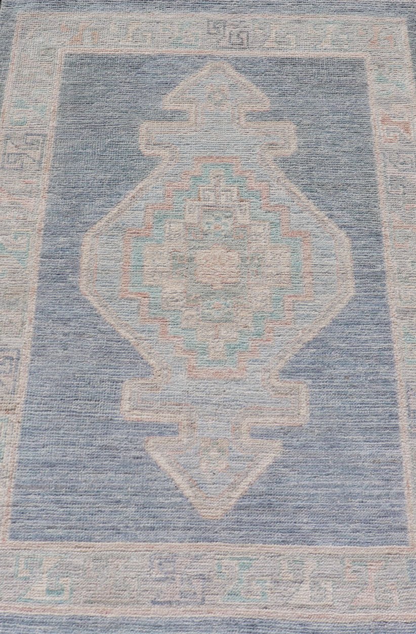 Measures: 2'7 x 3'11 Medallion Designed Modern Oushak with Blue Background and Cream Border. Keivan Woven Arts; rug AWR - 12400, Early 21st Century. This modern Oushak features large medallions in the center of a blue background, centering aro... - Keivan Woven ArtsAWR - 12400 - 23276