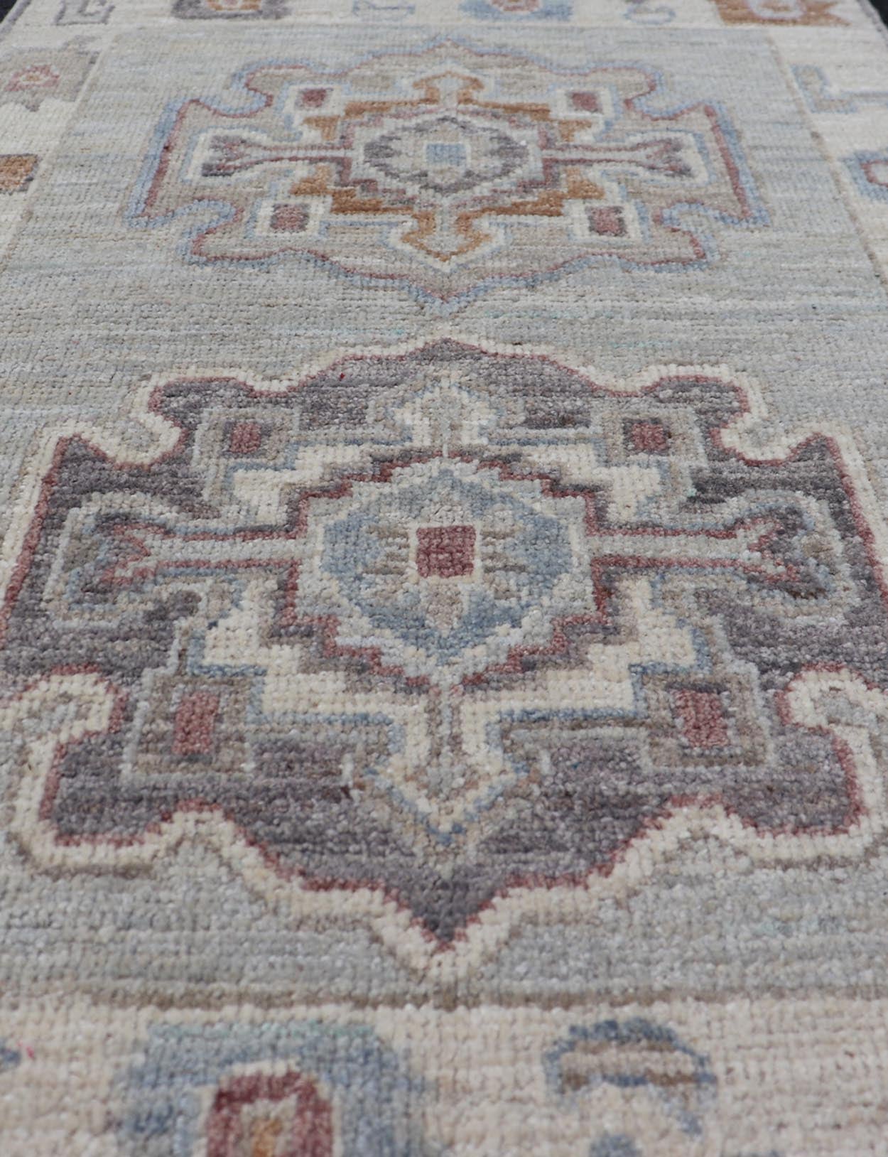 Modern Oushak Medallion Motif's on Light Grey Background and Earthy Tones. Keivan Woven Arts; rug AWR - 10644 Country of Origin: Afghanistan Type: Oushak Design. Measures: 2'0 x 3'2 The border and field are covered in floral - like motifs filled wit... - Keivan Woven ArtsAWR - 16044 - 24229Rug