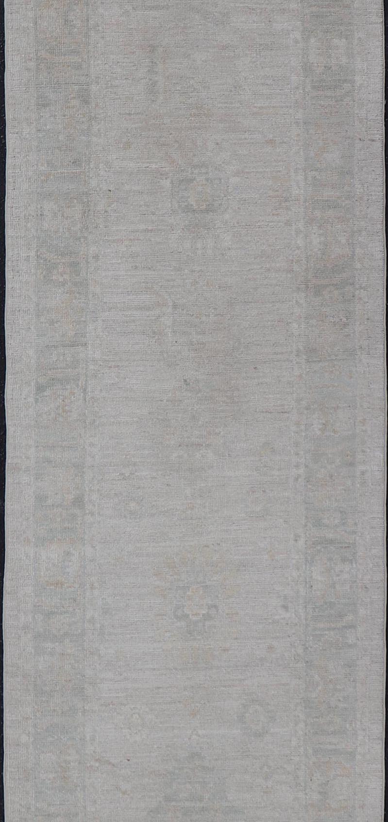 Hand - Knotted Oushak Runner with Medallion Design On A Cream Field With Blues. Keivan Woven Arts; rug AWR - 16727 Country of Origin: Afghanistan Type: Oushak Design: Medallion, Motif, Floral Motif. Measures: 2'8 x 11'10 This modern Oushak which ar... - Keivan Woven ArtsAWR - 16727 - 24294Rug