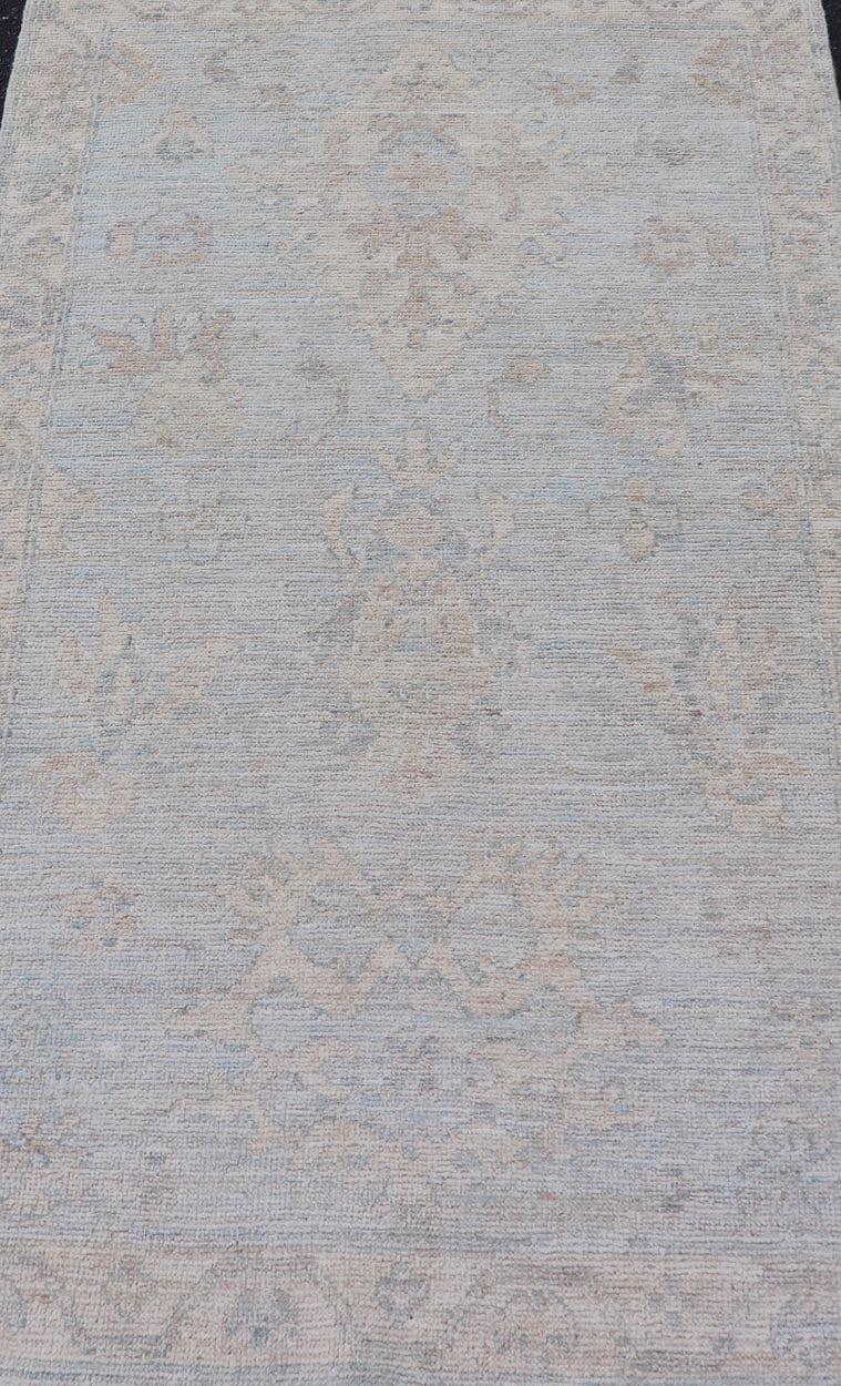 Modern Oushak Rug in All - Over Floral Motifs in Light Blue - Gray and Creams. Keivan Woven Arts; rug AWR - 16788 Country of Origin: Afghanistan Type: Oushak Design: All - Over, Floral. Measures: 2'11 x 5'3 Hand - Knotted in wool, this rustic looking flo... - Keivan Woven ArtsAWR - 16788 - 24456Rug