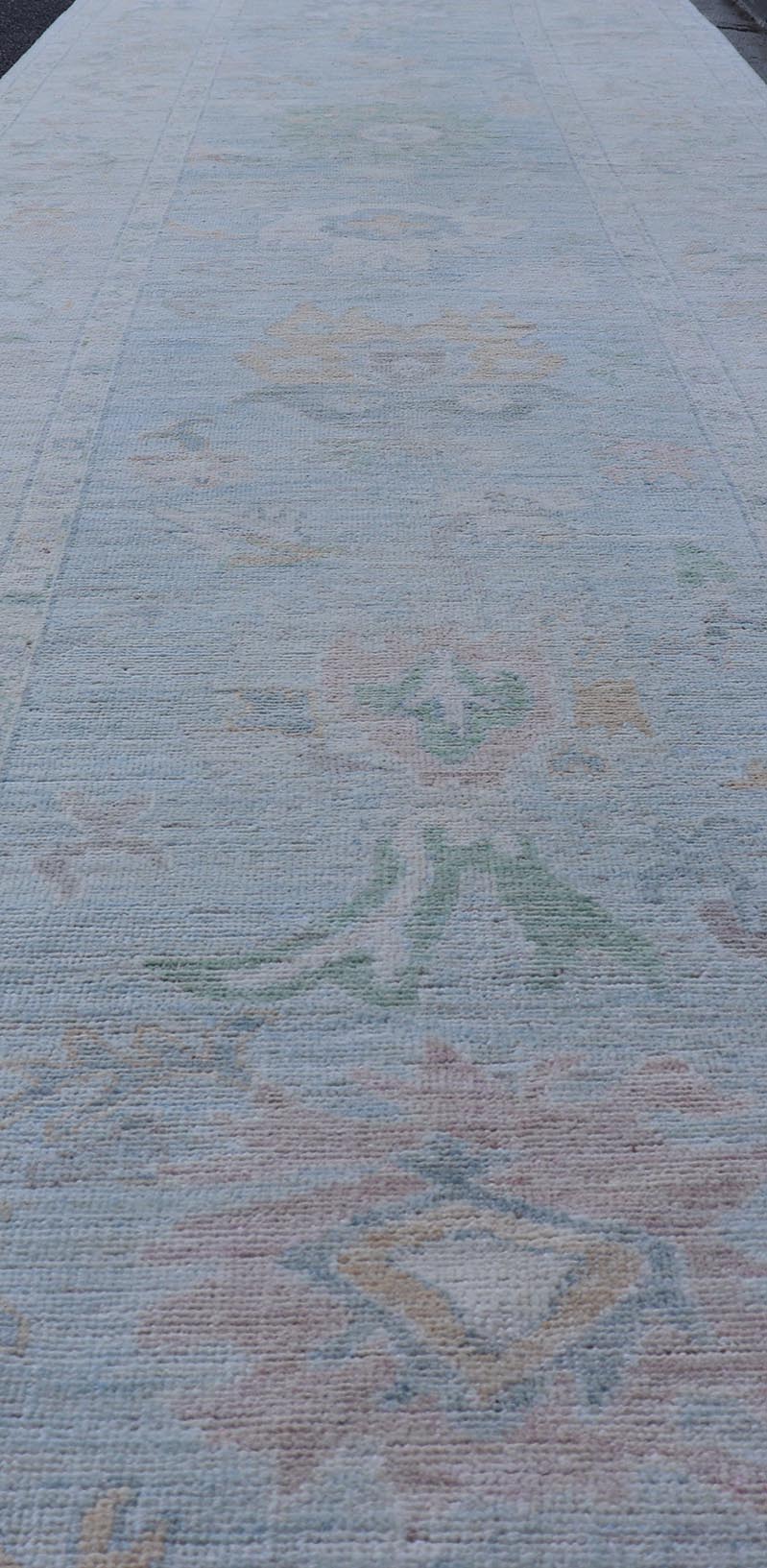 Neutral Color Gallery Oushak Runner with Medallion Design in Light Blue Field. Keivan Woven Arts; rug AWR - 17798 Country of Origin: Afghanistan Type: Oushak Design: Medallion, Motif, Floral Motif. Measures: 4'2 x 18'2 This modern piece holds med... - Keivan Woven ArtsAWR - 17798 - 25060Rug