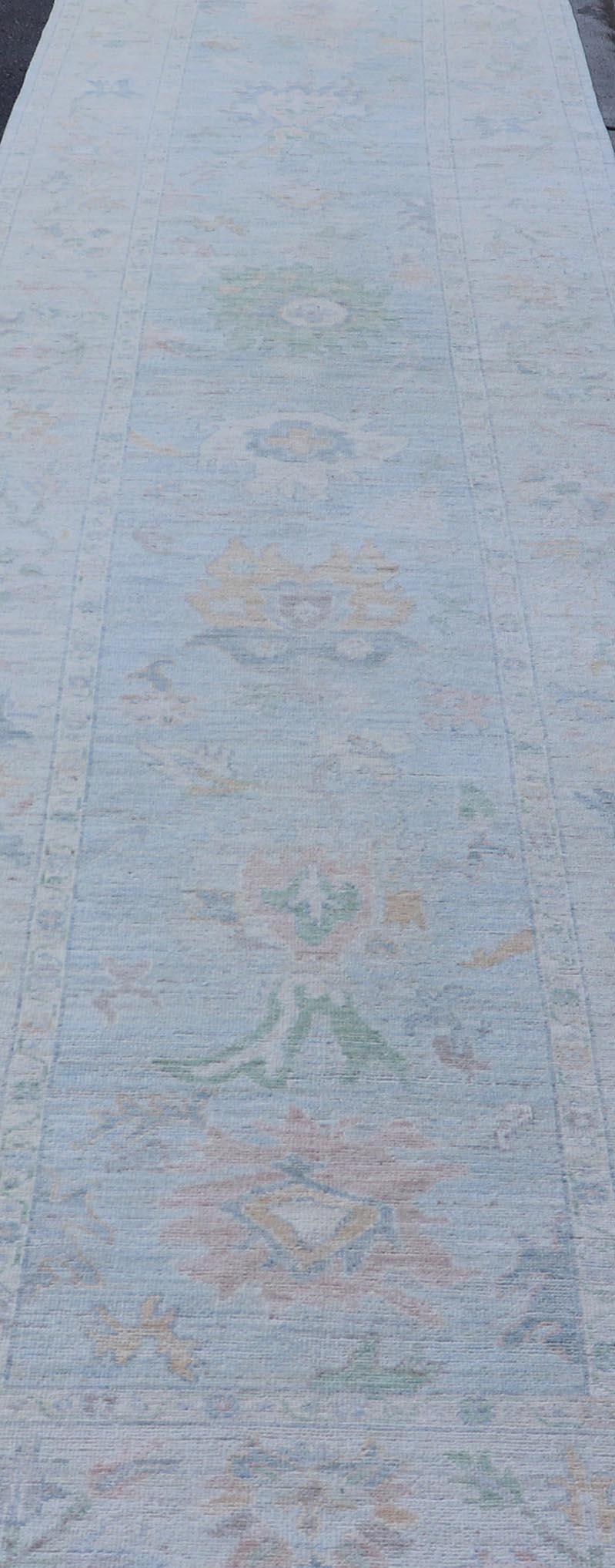 Neutral Color Gallery Oushak Runner with Medallion Design in Light Blue Field. Keivan Woven Arts; rug AWR - 17798 Country of Origin: Afghanistan Type: Oushak Design: Medallion, Motif, Floral Motif. Measures: 4'2 x 18'2 This modern piece holds med... - Keivan Woven ArtsAWR - 17798 - 25060Rug