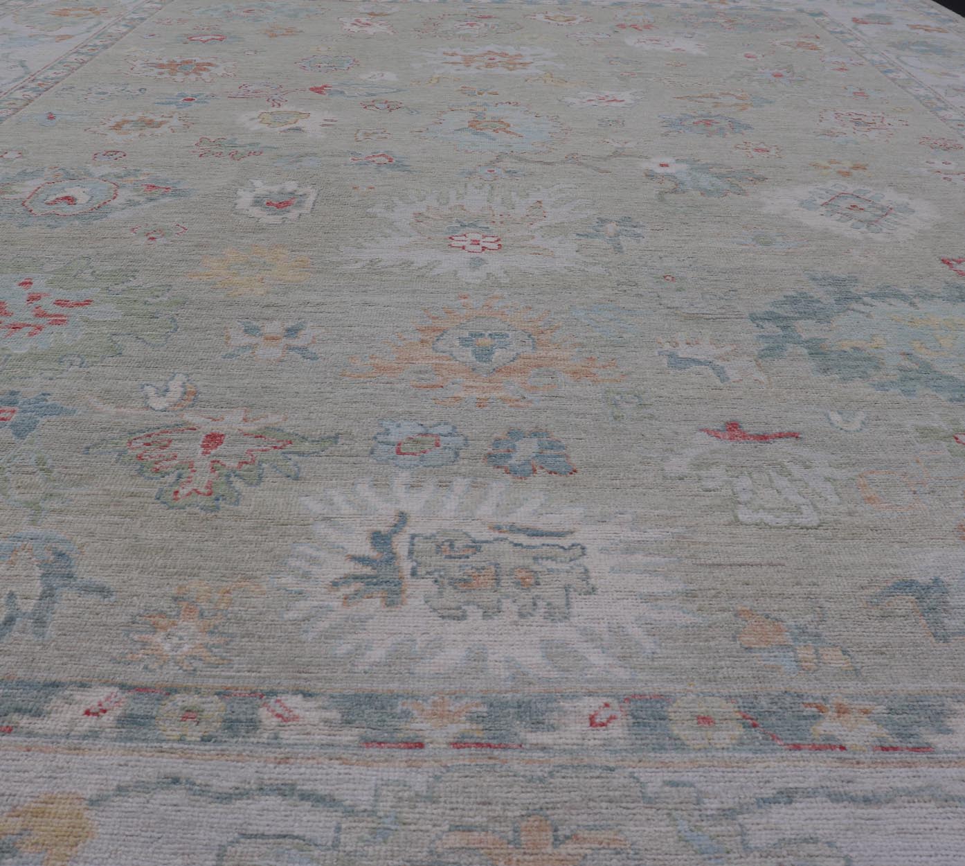 Measures: 10'2 x 13'9 Keivan Woven Arts Modern Oushak Rug in All - Over Floral Motifs. Keivan Woven Arts; rug AWR - 440 Country of Origin: Afghanistan Type: Oushak Design: All - Over, Floral. - Keivan Woven ArtsAWR - 440 - 27460Rug