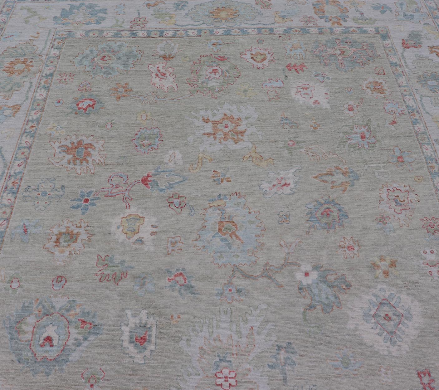 Measures: 10'2 x 13'9 Keivan Woven Arts Modern Oushak Rug in All - Over Floral Motifs. Keivan Woven Arts; rug AWR - 440 Country of Origin: Afghanistan Type: Oushak Design: All - Over, Floral. - Keivan Woven ArtsAWR - 440 - 27460Rug
