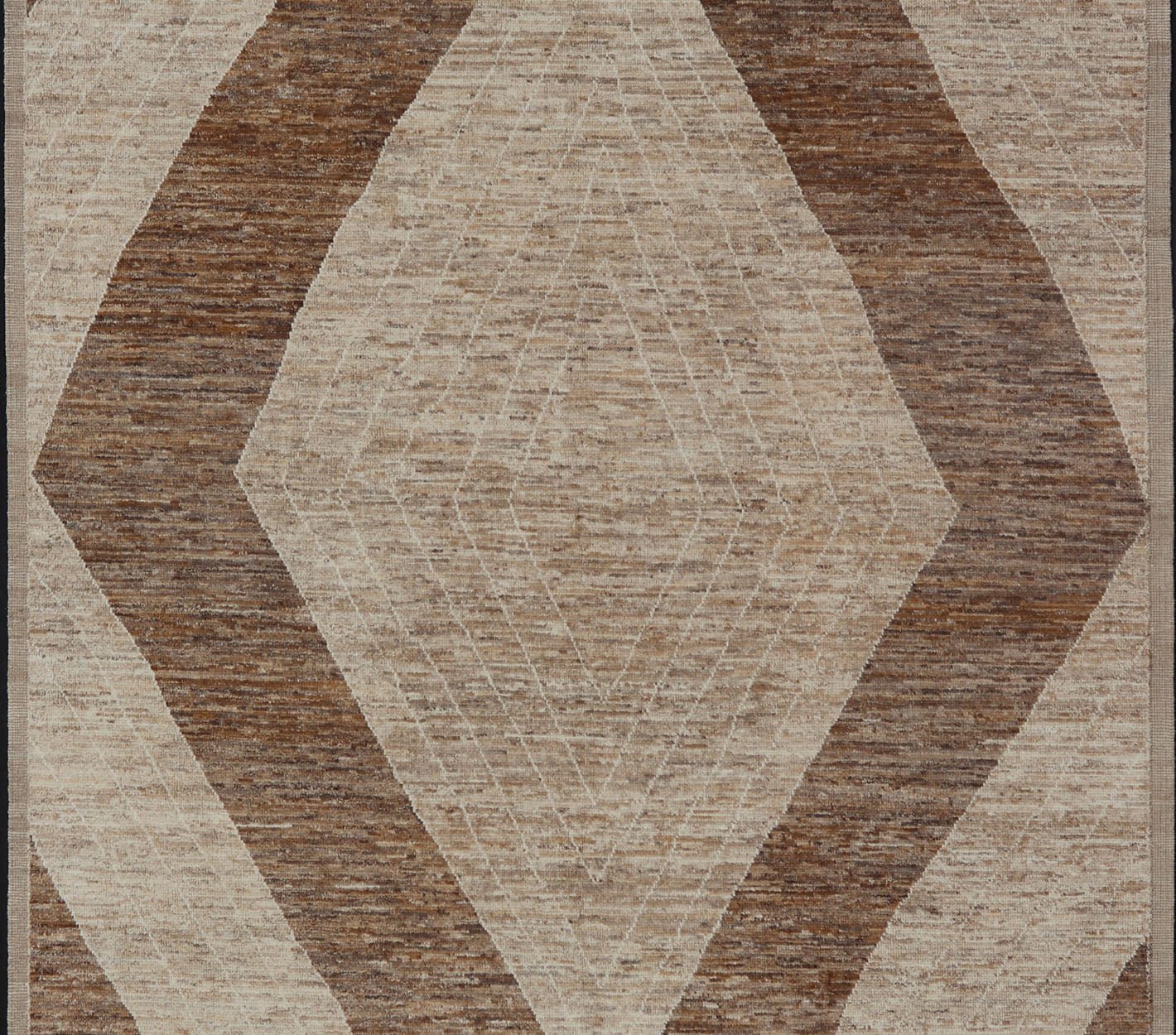 Measures: 10'6 x 14'1. This modern casual tribal rug has been hand - knotted in wool. The rug features a large modern diamond design, rendered in brown, tan, and cream; making this rug a superb fit for a variety of interiors. Modern Hand - Knotted Ru... - Keivan Woven ArtsAWR - 5004 - 17148Rug
