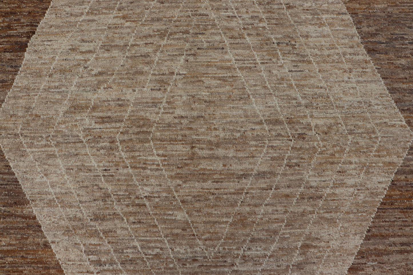 Measures: 10'6 x 14'1. This modern casual tribal rug has been hand - knotted in wool. The rug features a large modern diamond design, rendered in brown, tan, and cream; making this rug a superb fit for a variety of interiors. Modern Hand - Knotted Ru... - Keivan Woven ArtsAWR - 5004 - 17148Rug
