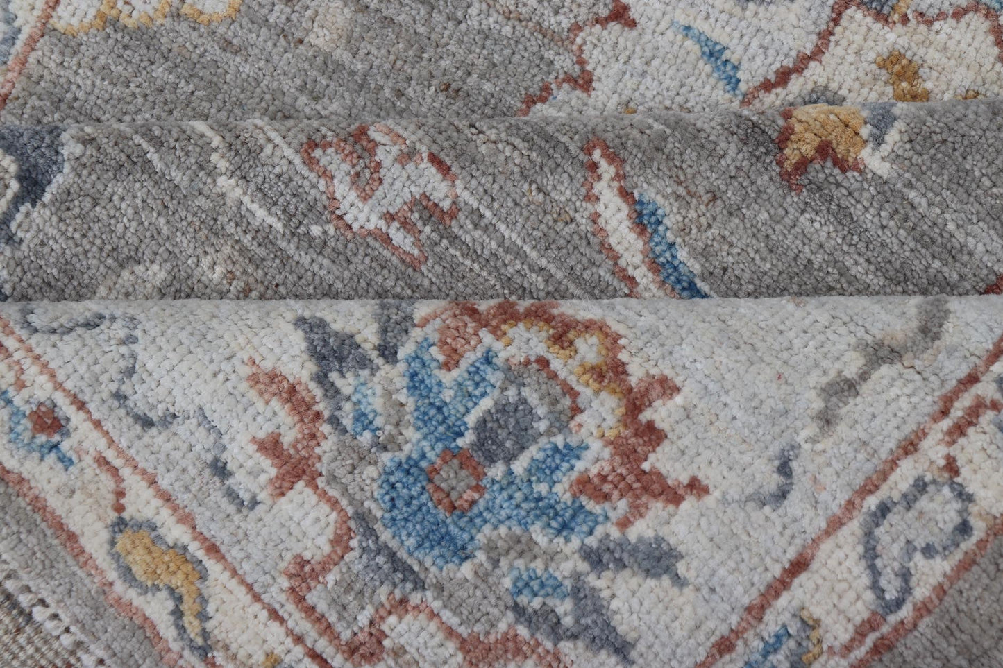 Floral Designed Oushak with Muted Background With Earthy Tones and Soft Blue Modern Oushak featuring an all - over, arabesque - like floral design. The background is rendered in a light gray, while the border is s light pewter blue. The design d... - Keivan Woven ArtsAWR - 6028 - 19971Rug