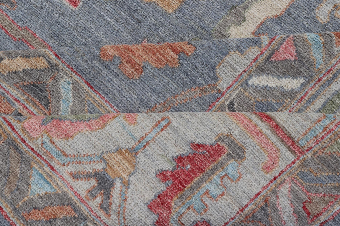Large Afghan Oushak Design with All - Over Multi Colored Floral Design in Wool This piece has very rich colors, from the enhanced dark gray - blue background, to the saturated tropical pinks and blues, oranges and taupe used in the design, The sligh... - Keivan Woven ArtsAWR - 6045 - 19995Rug