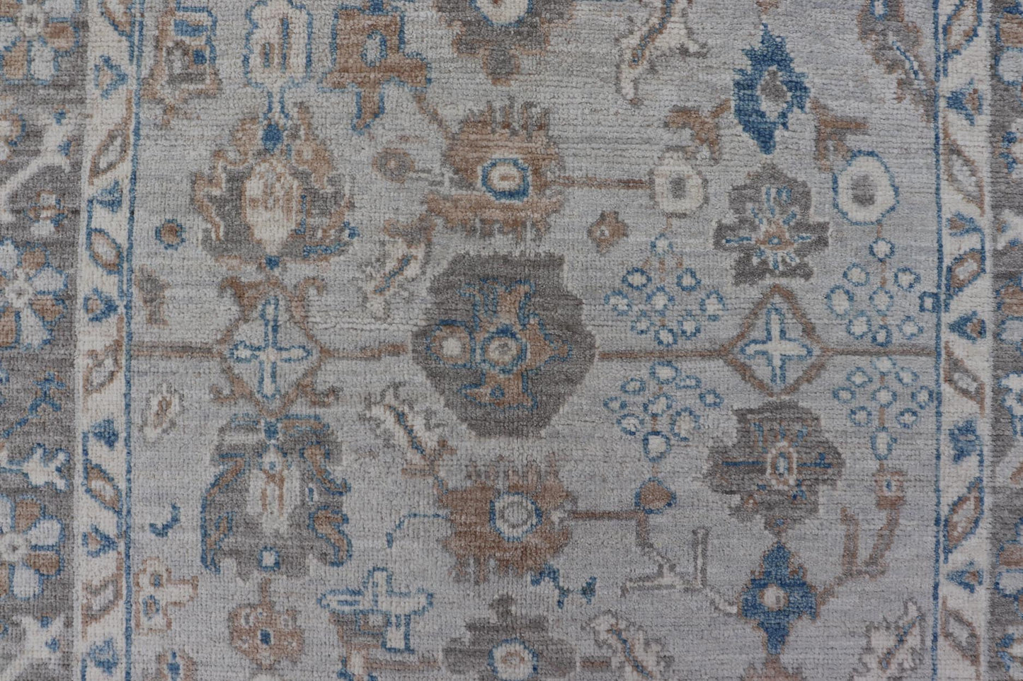 Hand - Knotted All - Over Floral Modern Oushak With Light Brown Border This beautiful contemporary piece starts with a floral border. The field has a modest silvery background with an all - over design rendered with earthy tones, such as wood brown, t... - Keivan Woven ArtsAWR - 6060 - 20001Rug