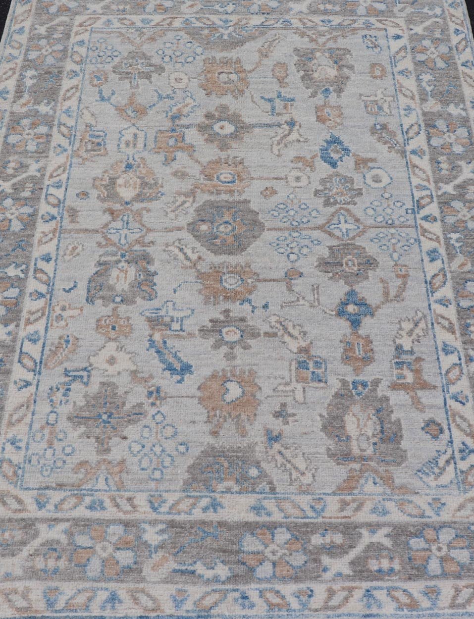 Hand - Knotted All - Over Floral Modern Oushak With Light Brown Border This beautiful contemporary piece starts with a floral border. The field has a modest silvery background with an all - over design rendered with earthy tones, such as wood brown, t... - Keivan Woven ArtsAWR - 6060 - 20001Rug