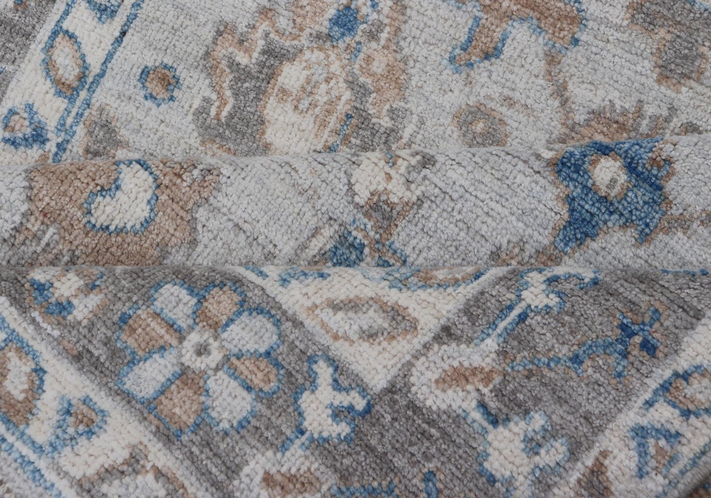 Hand - Knotted All - Over Floral Modern Oushak With Light Brown Border This beautiful contemporary piece starts with a floral border. The field has a modest silvery background with an all - over design rendered with earthy tones, such as wood brown, t... - Keivan Woven ArtsAWR - 6060 - 20001Rug