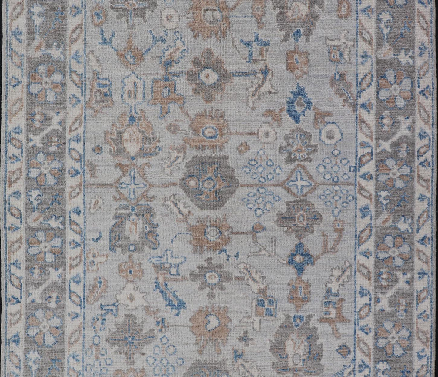 Hand - Knotted All - Over Floral Modern Oushak With Light Brown Border This beautiful contemporary piece starts with a floral border. The field has a modest silvery background with an all - over design rendered with earthy tones, such as wood brown, t... - Keivan Woven ArtsAWR - 6060 - 20001Rug