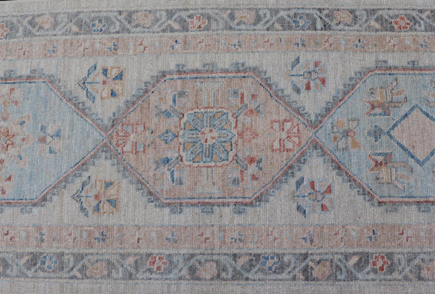 Modern Oushak Medallion Runner in Pastel Color Tones This Afghan Oushak presents a double - lined floral border on top of a light gray background, accenting colors such as blue, red, and salmon. These mix of tones gives a great contrast to many in... - Keivan Woven ArtsAWR - 6290 - 20037Rug