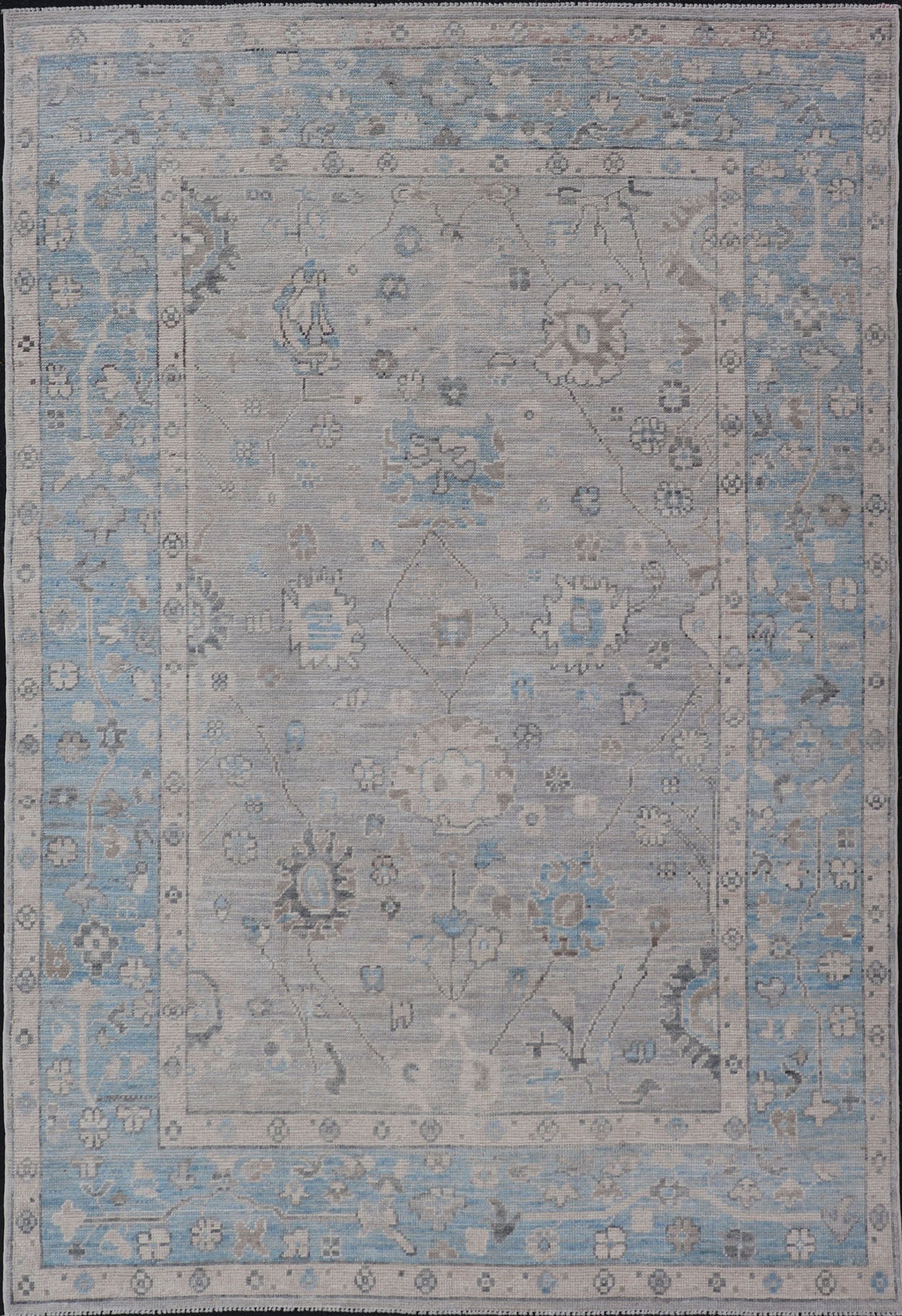 Hand - Knotted Light Blue Oushak with Light Gray Background Hand - Knotted in Afghanistan, this rustic piece holds charm within a powder blue border and a light gray field background. Above lays a modest Oushak - styled floral design reaching all ... - Keivan Woven ArtsAWR - 6309 - 20049Rug
