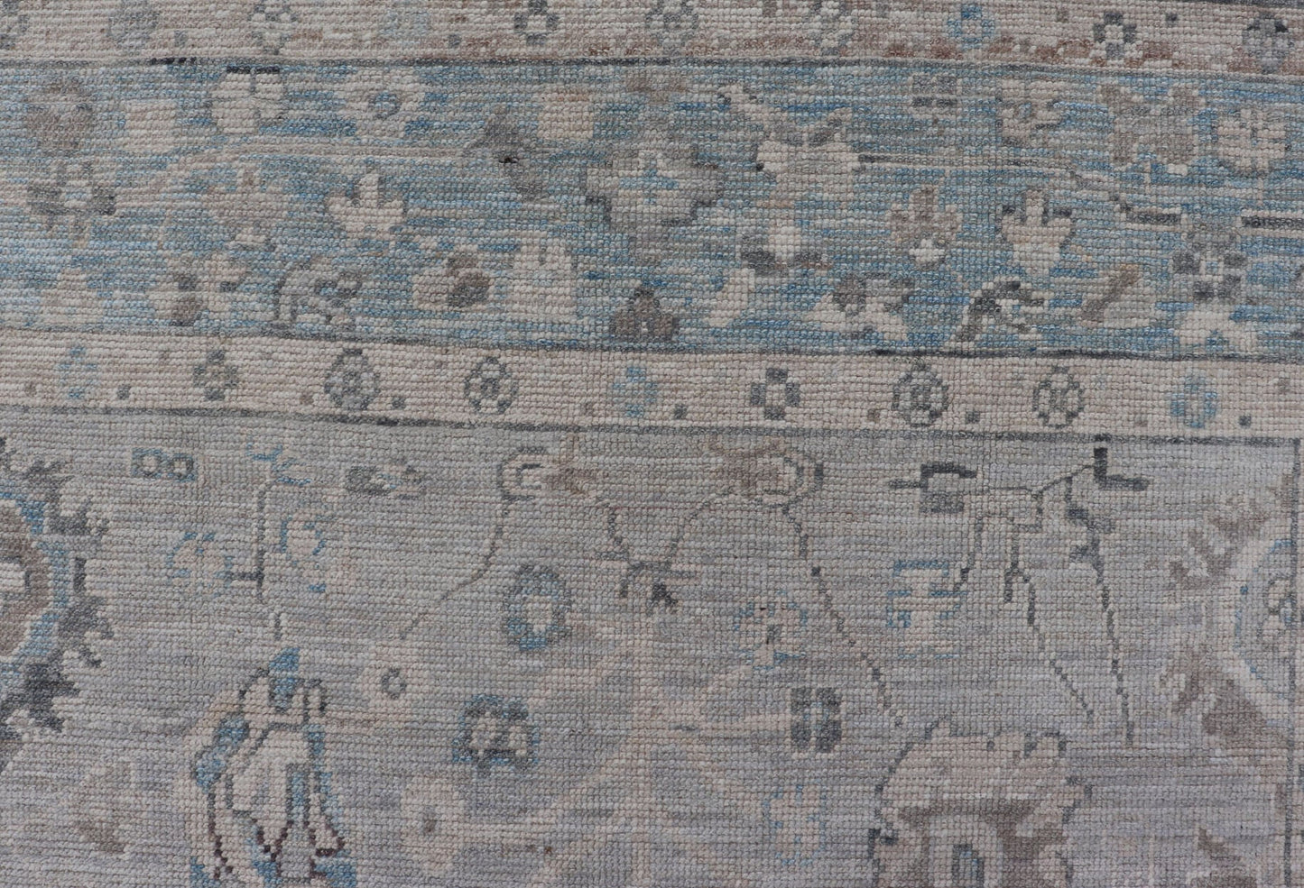Hand - Knotted Light Blue Oushak with Light Gray Background Hand - Knotted in Afghanistan, this rustic piece holds charm within a powder blue border and a light gray field background. Above lays a modest Oushak - styled floral design reaching all ... - Keivan Woven ArtsAWR - 6309 - 20049Rug
