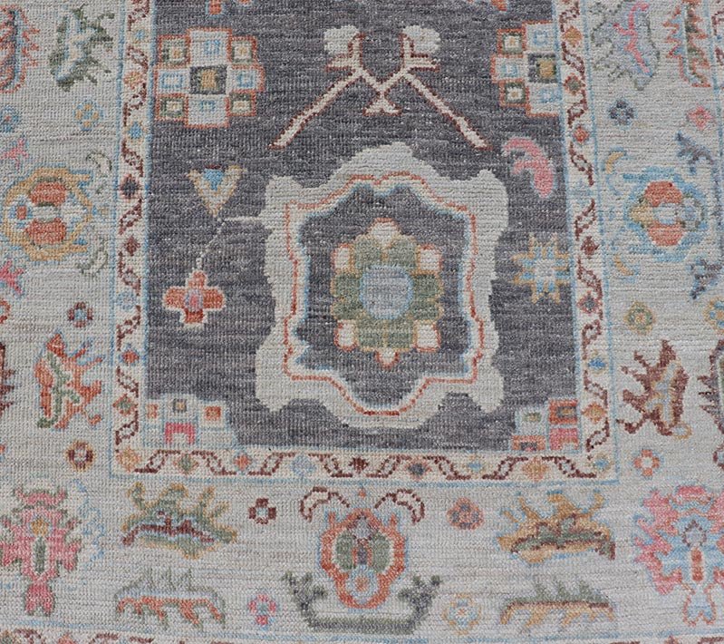 Hand Knotted Afghan Oushak Designed Runner with Gray Background This Afghan Oushak runner features a grand motif, showcasing from the border to the field with a vibrant elegance that pops against the light blue - gray border, as well as the charc... - Keivan Woven ArtsAWR - 6463 - 19911Rug