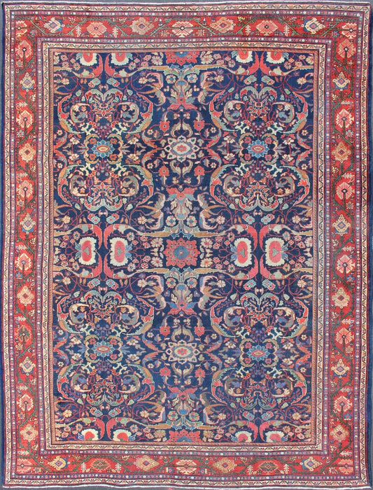 Colorful Antique Persian Sultanabad Rug with Navy Blue Field and Red Border. Antique Persian Sultanabad in Blue background and colorful field. Keivan Woven Arts/rug/ B - 0536, country of origin / type: Iran / Sultanabad, circa 1910 Measures: 9 x 1... - Keivan Woven ArtsB - 0536 - 621