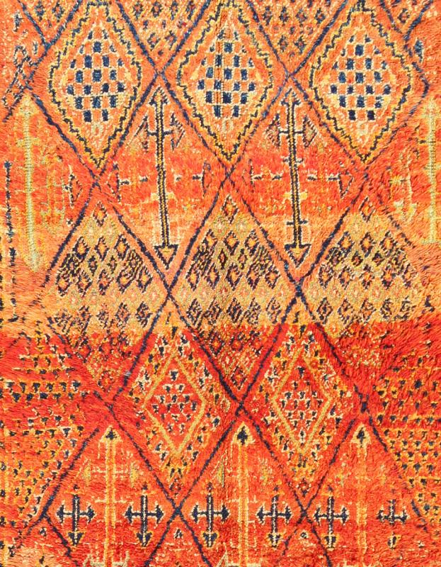 Vintage Moroccan Beni Mklid Rug in Oranges and Creams with Deep Navy Blue Measures: 5'11'' x 10'4''. Woven on a gorgeous luscious black wool base, this original vintage carpet features finely structured diamonds flanked by skillfully woven sy... - Keivan Woven ArtsBDS - 136614 - 7271Rug