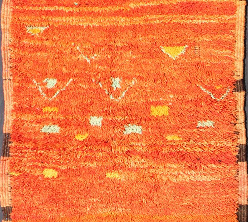 Vintage Small Moroccan Boujaad Rug in Variegated Saffron and Orange Colors Measures: 3'0'' x 7'0''. This original carpet features intricate symbols based mostly on tribal motifs, with multiple shades of orange, saffron, as well as burnt orang... - Keivan Woven ArtsBDS - 136619 - 7275Rug