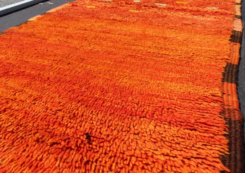 Vintage Small Moroccan Boujaad Rug in Variegated Saffron and Orange Colors Measures: 3'0'' x 7'0''. This original carpet features intricate symbols based mostly on tribal motifs, with multiple shades of orange, saffron, as well as burnt orang... - Keivan Woven ArtsBDS - 136619 - 7275Rug