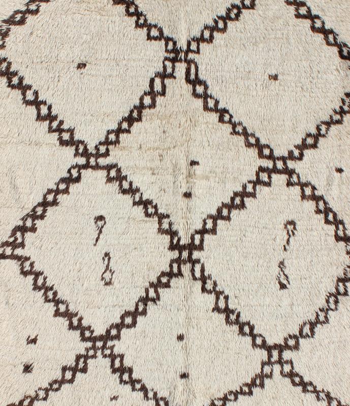 White Background Mid - Century Moroccan Azilal Rug with Brown Diamond Design Measures: 4'10'' x 7'0''. This graphic handwoven, tribal Beni Ourain rug features an all - over design of large, interconnected diamond shapes, some of which host tribal... - Keivan Woven ArtsBDS - 136623 - 7283Rug