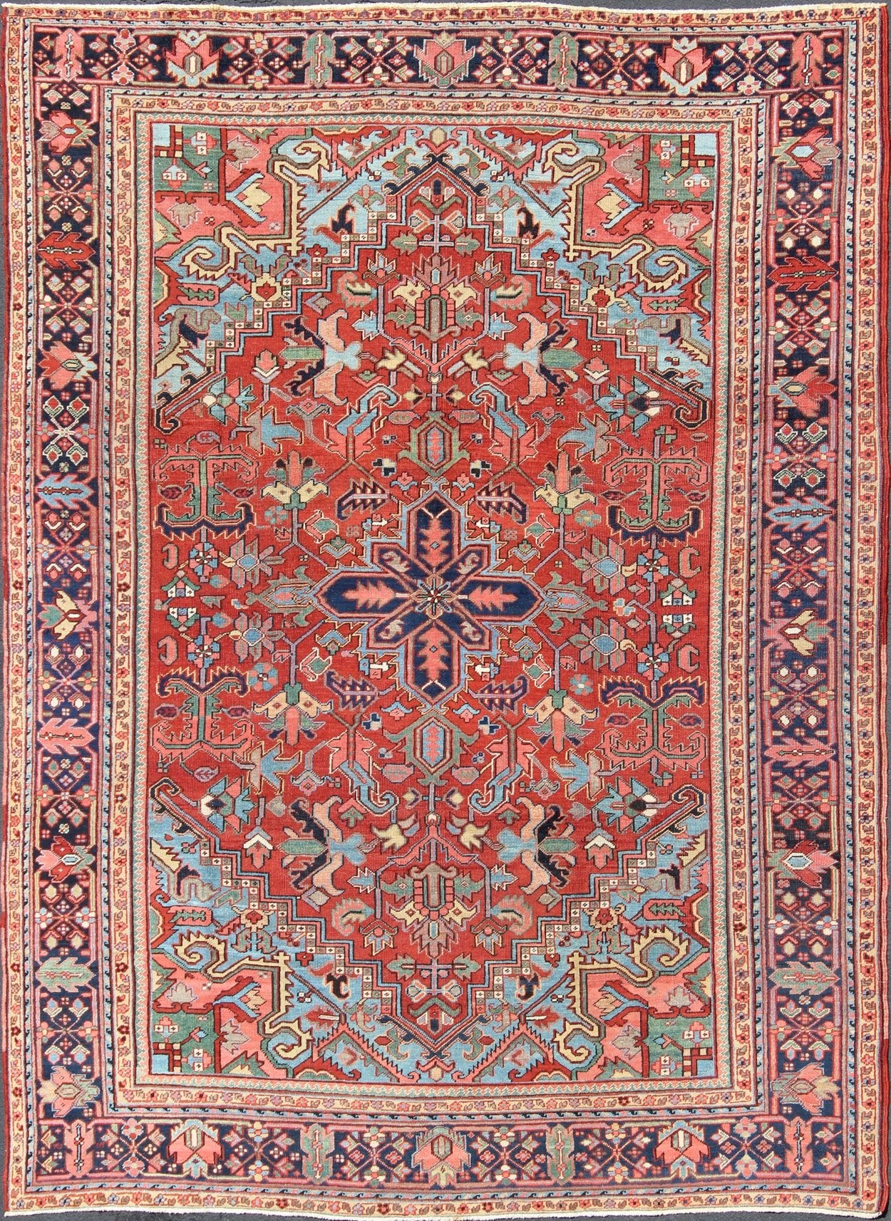 Antique Heriz - Serapi Rug with Small Central Medallion and Geometric Design Made in the early 20th Century in Iran, this charming antique Heriz features an open design and an array of cheerful colors. Surrounding its small central medallion, this... - Keivan Woven ArtsC - 0105 - 1726Rug