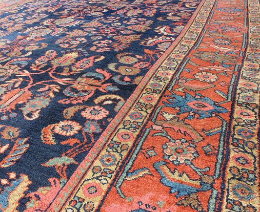 Antique Mahal Rug with Dark Blue Field & Coral Red Border Filled with Floral Motifs. Antique Mahal with Floral design. Keivan Woven Arts / rug CAM - B59, country of origin / type: Iran / Mahal/Sultanabad , circa 1920. Measures: 8 x 11'0. T... - Keivan Woven ArtsCAM - B59 - 736