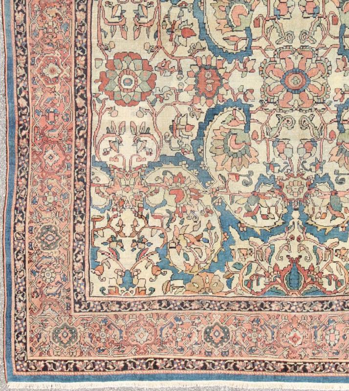 Antique Persian Sultanabad Rug with Ivory Background This exemplary antique Sultanabad rug features a large - scale design comprised of palmettes and stylized flowers. The gorgeous piece is characterized by a rare color combination: An ivory field... - Keivan Woven ArtsD - 0702 - 3011Rug