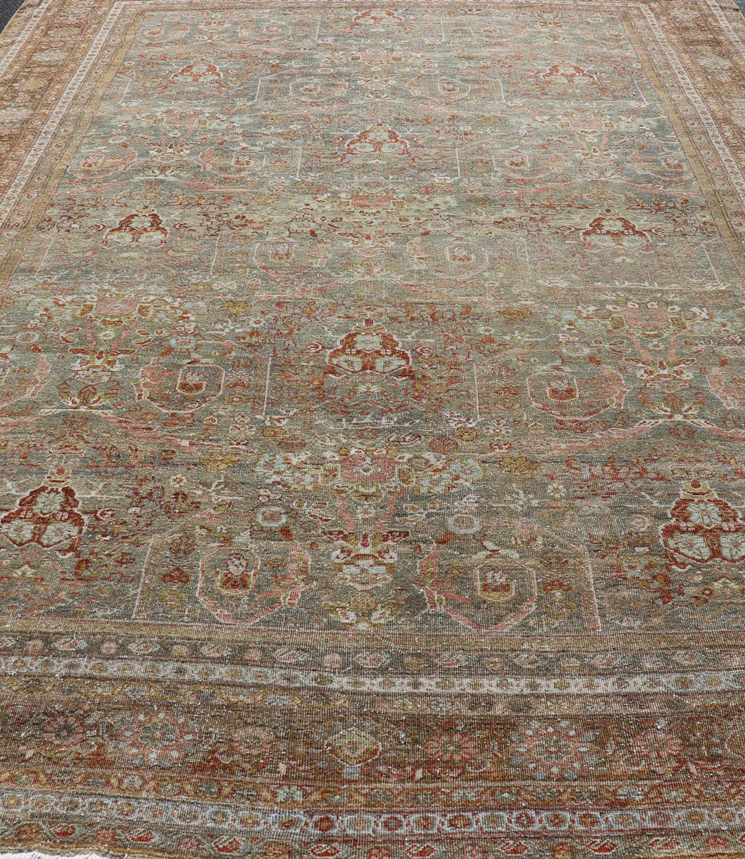Distressed Antique Persian Sultanabad Rug in Faded Grey Background with green, salmon, pink, brown. distressed antique rug, distressed antique Sultanabad, distressed antique Mahal. Antique distressed Persian rug. Sultanabad Mahal antique rug fro... - Keivan Woven ArtsDAN - 1701 - 8493Rug