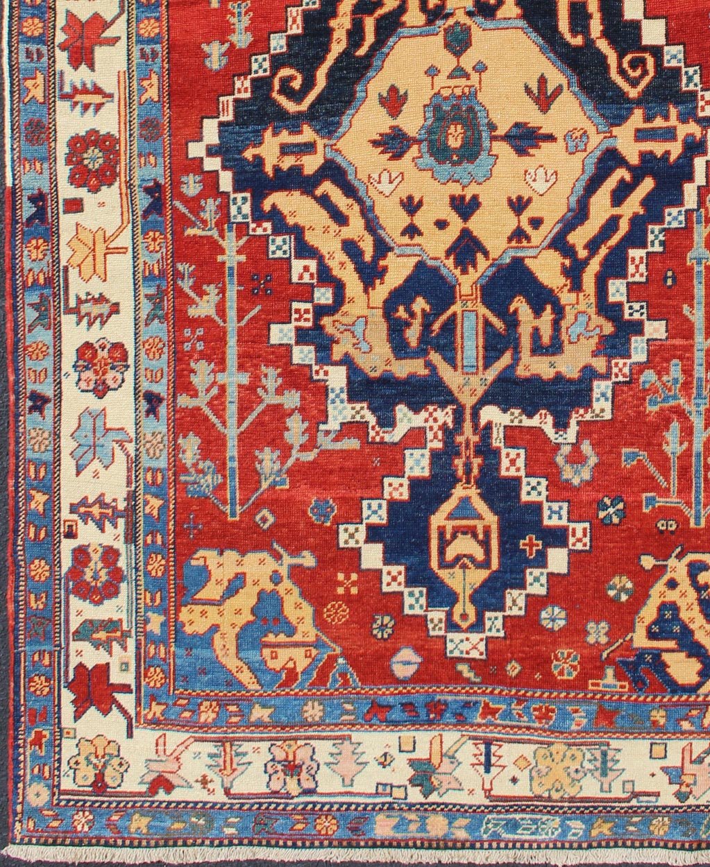 Vintage Turkish Tribal Rug with Jewel - Toned Central Medallion and Vivid Border This vintage Turkish Tribal rug features a large central medallion and a jewel - toned geometric design surrounded by a vivid blue and ivory border. Measures: 4'9 x ... - Keivan Woven ArtsDSP - WL30362 - 4134Rug