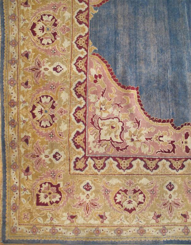 Antique 19th Century Indian Agra Rug in Solid Blue Background This stunning antique Agra carpet beautifully illustrates the magnificent splendor of mid - 19th Century Indian design and craftsmanship. The unusually bold open center field in various... - Keivan Woven ArtsE - 1009 - 677Rug