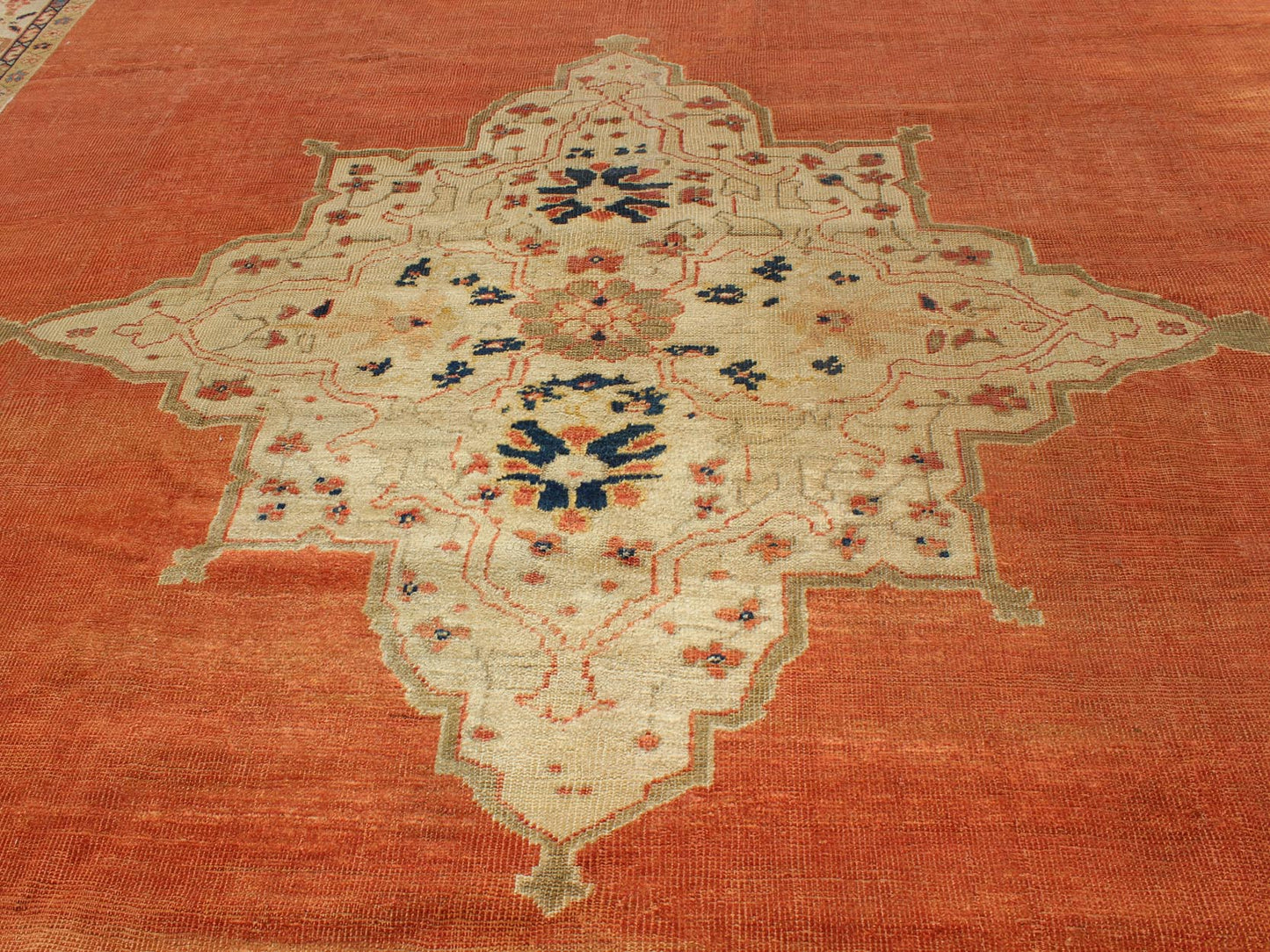 Large Antique Ziegler Sultanabad rug with central medallion in soft orange, ivory and pops of navy blue. Keivan Woven Arts / E - 1207. Late 19th Century Persian Antique Ziegler, antique Persian Ziegler. Measures: 10'2 x 14'5 This striking antique Z... - Keivan Woven ArtsE - 1207 - 1827Rug