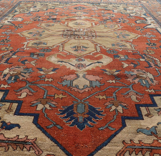 Antique Persian Serapi Rug in Geometric Medallion Design with Orange, blue & Cream. Antique Persian Serapi rug with colorful and detailed layered medallion in Rust, Orange, ivory & medium blue, light green, light orange, Salmon. Keivan Woven Ar... - Keivan Woven ArtsEB - 200644 - 13086Rug
