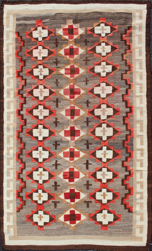Antique Navajo Blanket with All Over Geometric in Gray, Red, Brown and Ivory. Keivan Woven Arts - Antique Navajo blanket in Multi Colors, rug EB - 29, country of origin / type: USA / Navajo Tribe This intriguing antique Navajo rug was woven in the Un... - Keivan Woven ArtsEB - 29 - 12589Rug