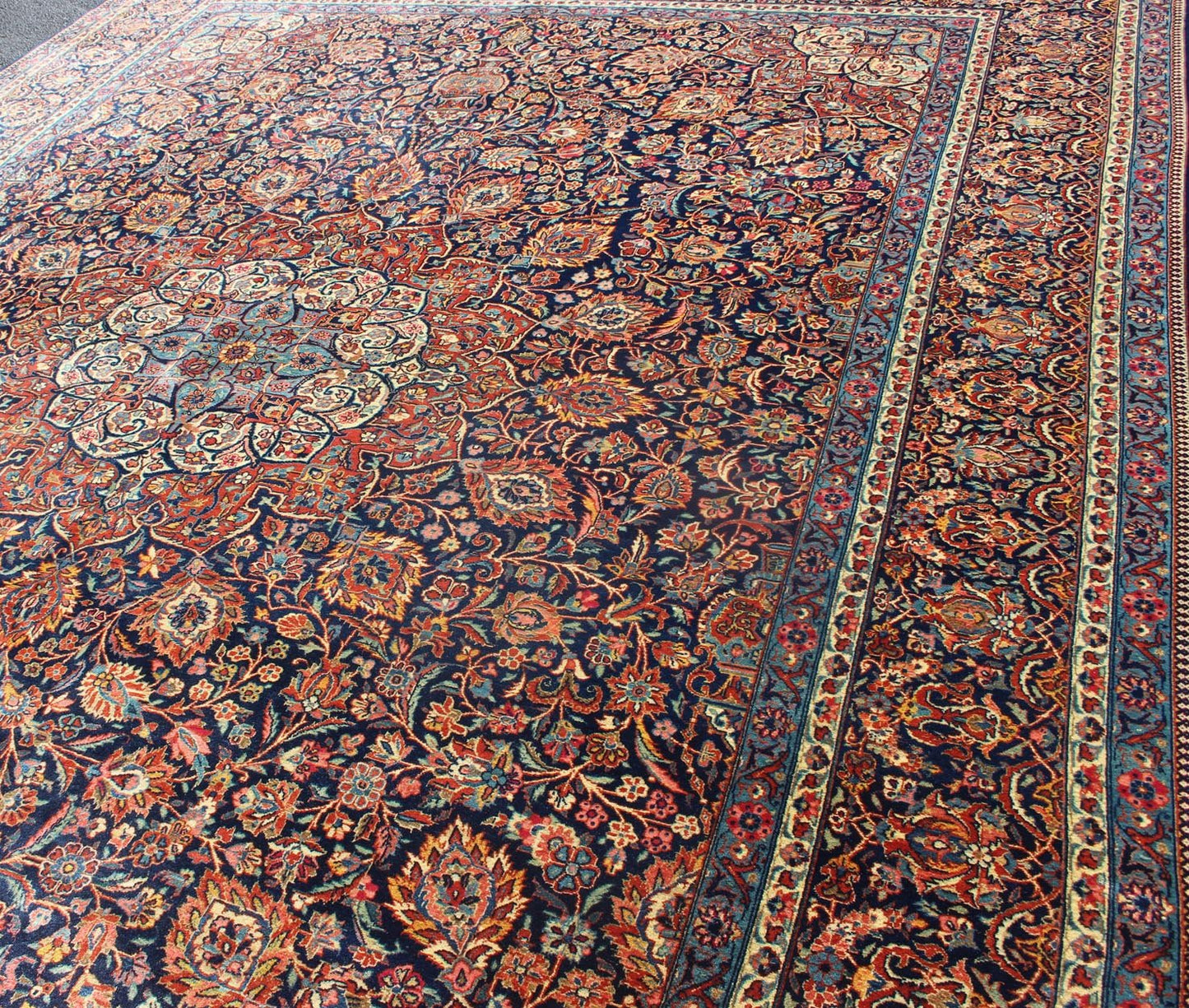 Persian Kashan All - Over Floral Fine Weave in Navy Background Fine Kashan Red and blue antique Persian Kashan rug with Arabesque blossom design, rug EB - CON1 - 13001, country of origin / type: Iran / Kashan, circa 1910 Distinct colors that a... - Keivan Woven ArtsEB - CON1 - 13001 - 12597Rug