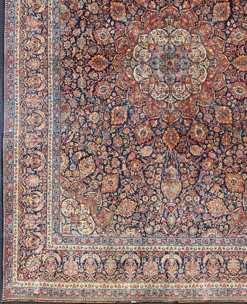 Persian Kashan All - Over Floral Fine Weave in Navy Background Fine Kashan Red and blue antique Persian Kashan rug with Arabesque blossom design, rug EB - CON1 - 13001, country of origin / type: Iran / Kashan, circa 1910 Distinct colors that a... - Keivan Woven ArtsEB - CON1 - 13001 - 12597Rug