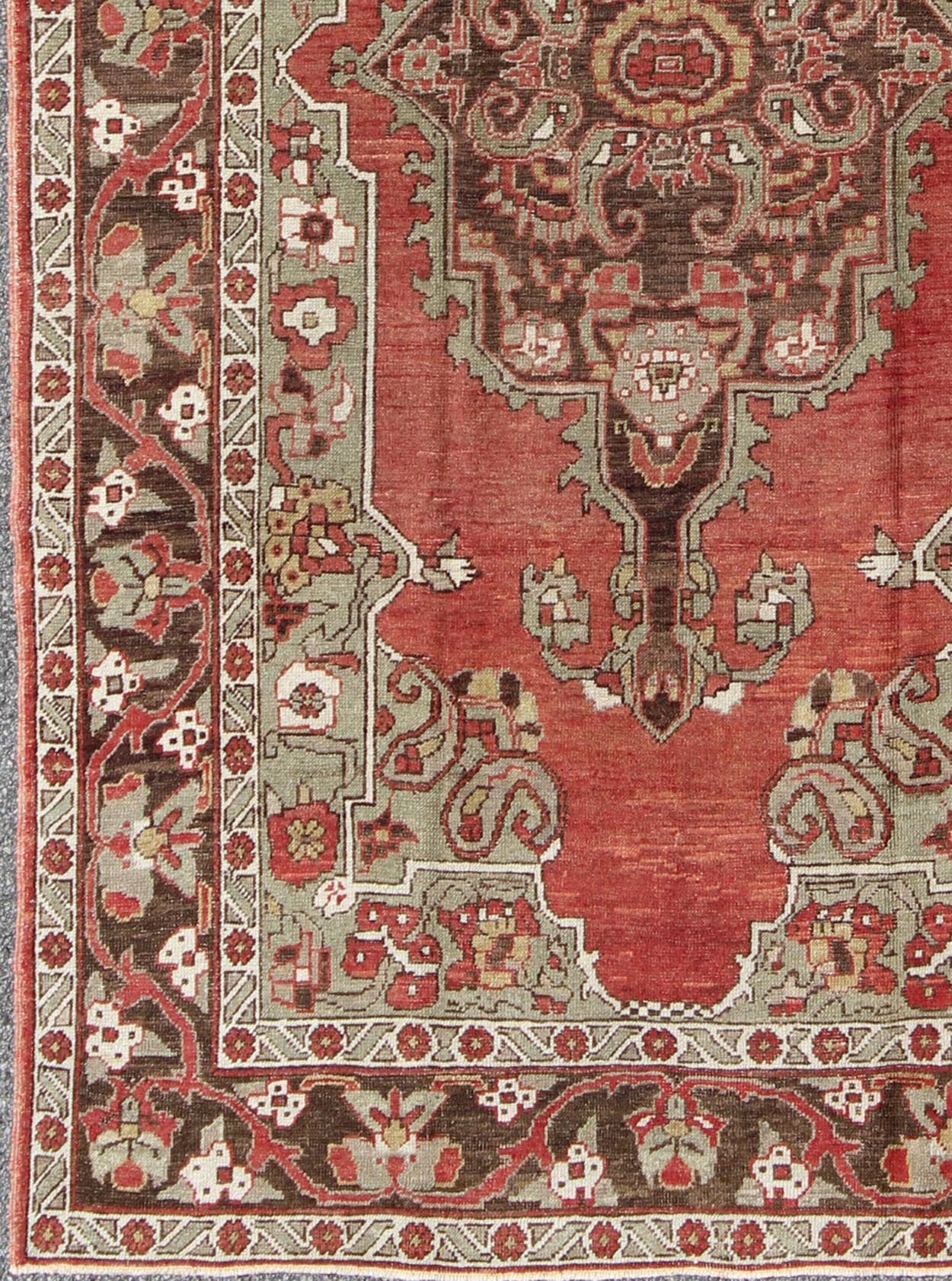 Antique Turkish Oushak Carpet with Medallion in Soft Red, Green and Brown. Antique Turkish Oushak Carpet with Medallion in Soft Red, Green and Brown. Rug/EL - 12265. Antique Oushak, Antique Turkish Rug This lovely antique Turkish Oushak rug displa... - Keivan Woven ArtsEL - 12265 - 968Rug