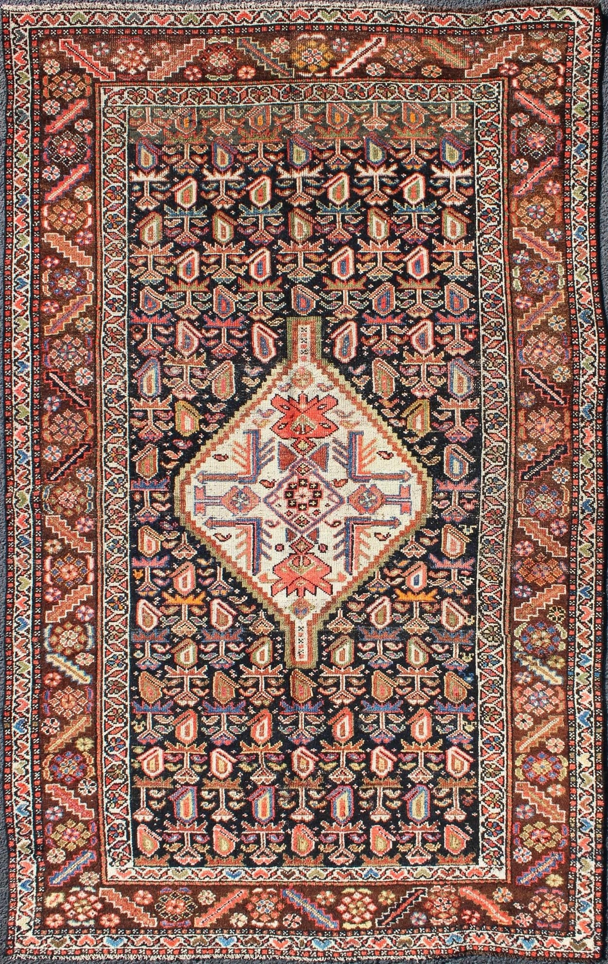 Antique Persian Kurdish Colorful Rug with Medallion and Geometric Motifs kwarugs Geometric antique Kurdish rug from Persia with medallion and all - over design, rug ema - 7570, country of origin / type: Iran / Kurdish, circa 1910. This antiqu... - Keivan Woven ArtsEMA - 7570 - 9842Rug