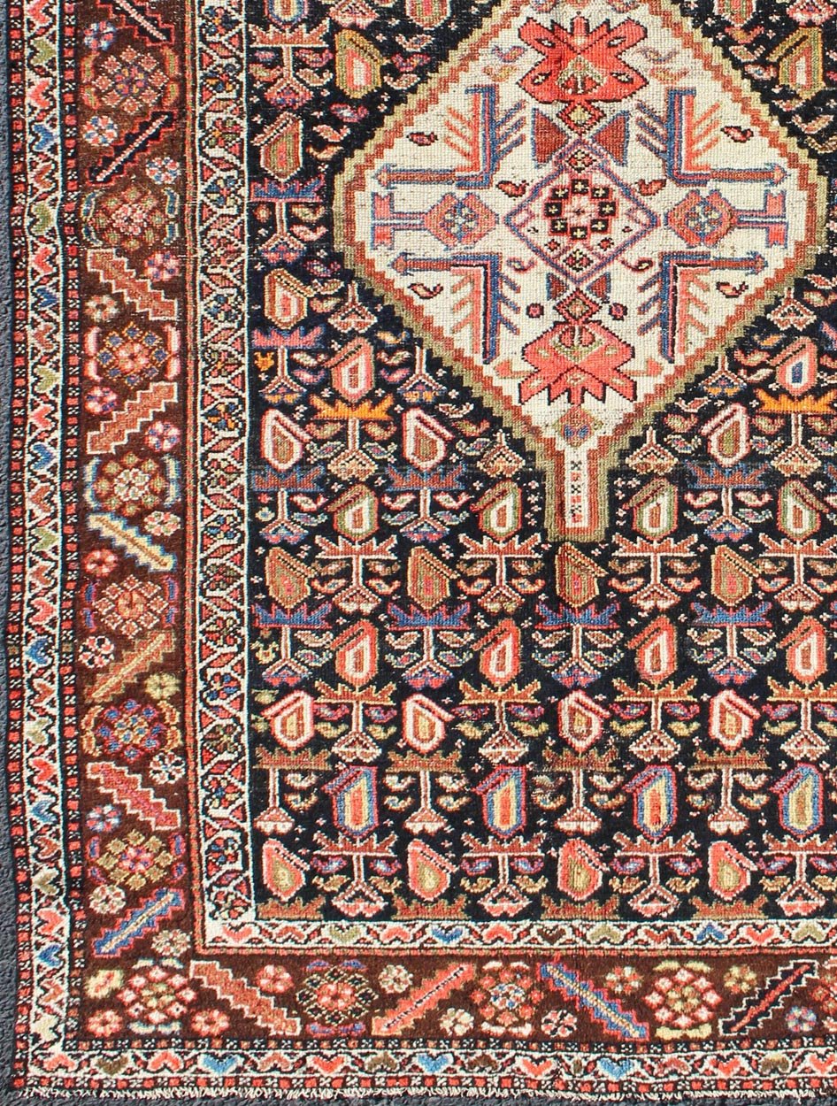 Antique Persian Kurdish Colorful Rug with Medallion and Geometric Motifs kwarugs Geometric antique Kurdish rug from Persia with medallion and all - over design, rug ema - 7570, country of origin / type: Iran / Kurdish, circa 1910. This antiqu... - Keivan Woven ArtsEMA - 7570 - 9842Rug