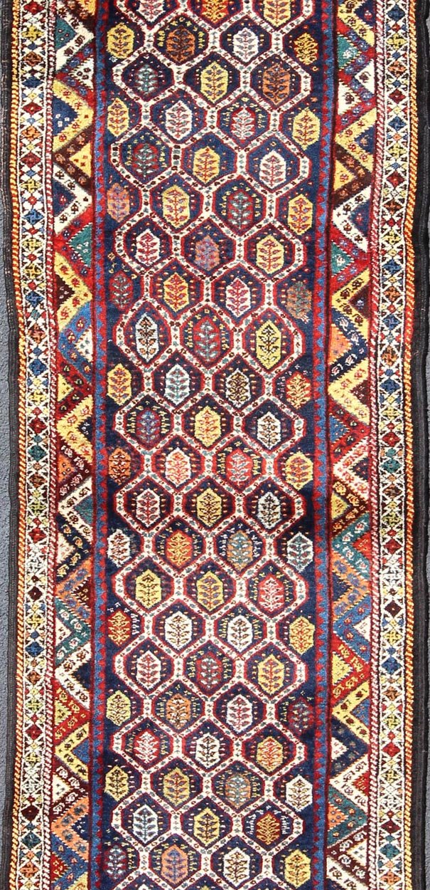 Colorful Antique Persian Lori Runner with Repeating Geometric Palmette Design Lori Antique Persian Runner in Multi - Colors with All - Over Geometric Leaf Design, rug ema - 7576, country of origin / type: Iran / Mahal, circa 1900 This antique P... - Keivan Woven ArtsEMA - 7576 - 9858Rug